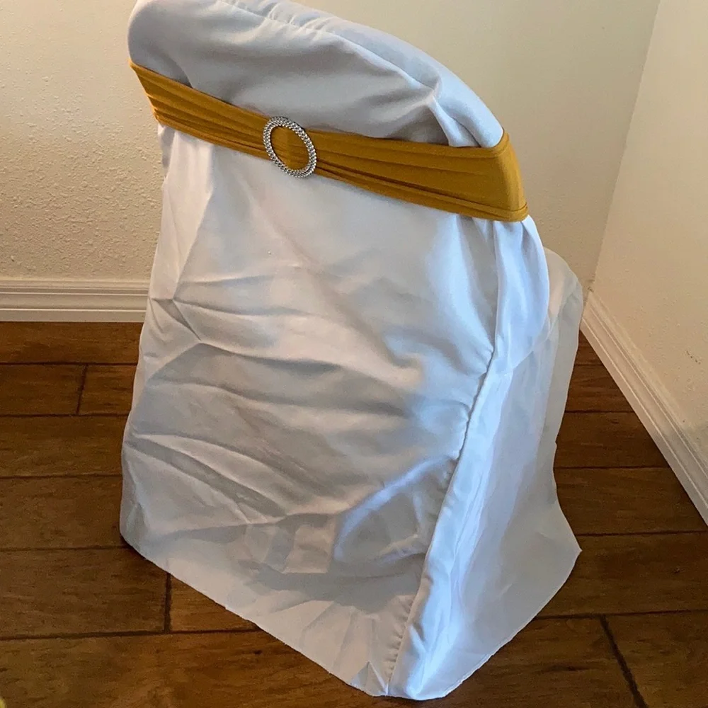 Chair Covers & gold chair bows New Year’s Eve, wedding, graduation, decor